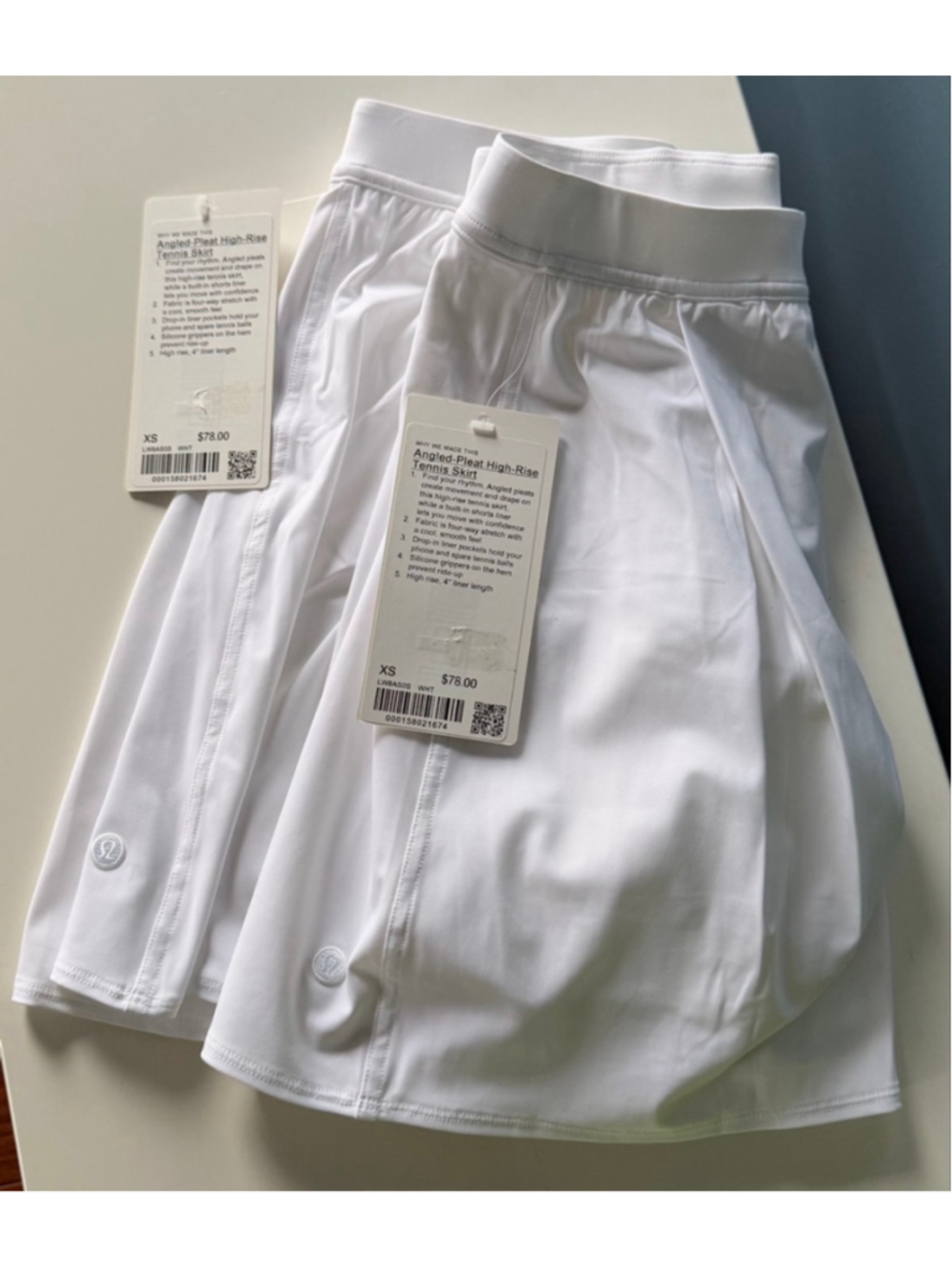 Size XS
Angled-Pleat High-Rise
Tennis Skirt, 4" liner length, NWT, white